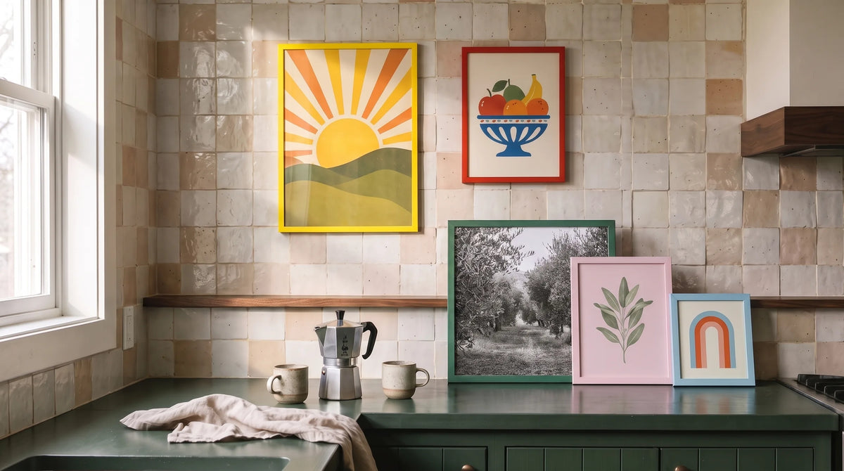Colorful wood picture frames in yellow, red, green, pink and light blue on a tiled kitchen wall