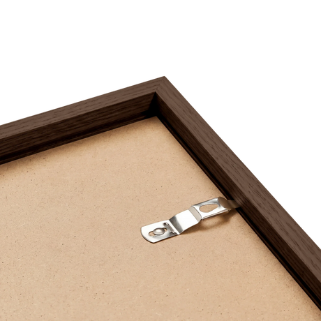 Dark oak frame back corner showing wood grain and hardware