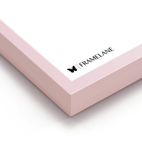 Pink frame corner detail showing painted solid wood finish