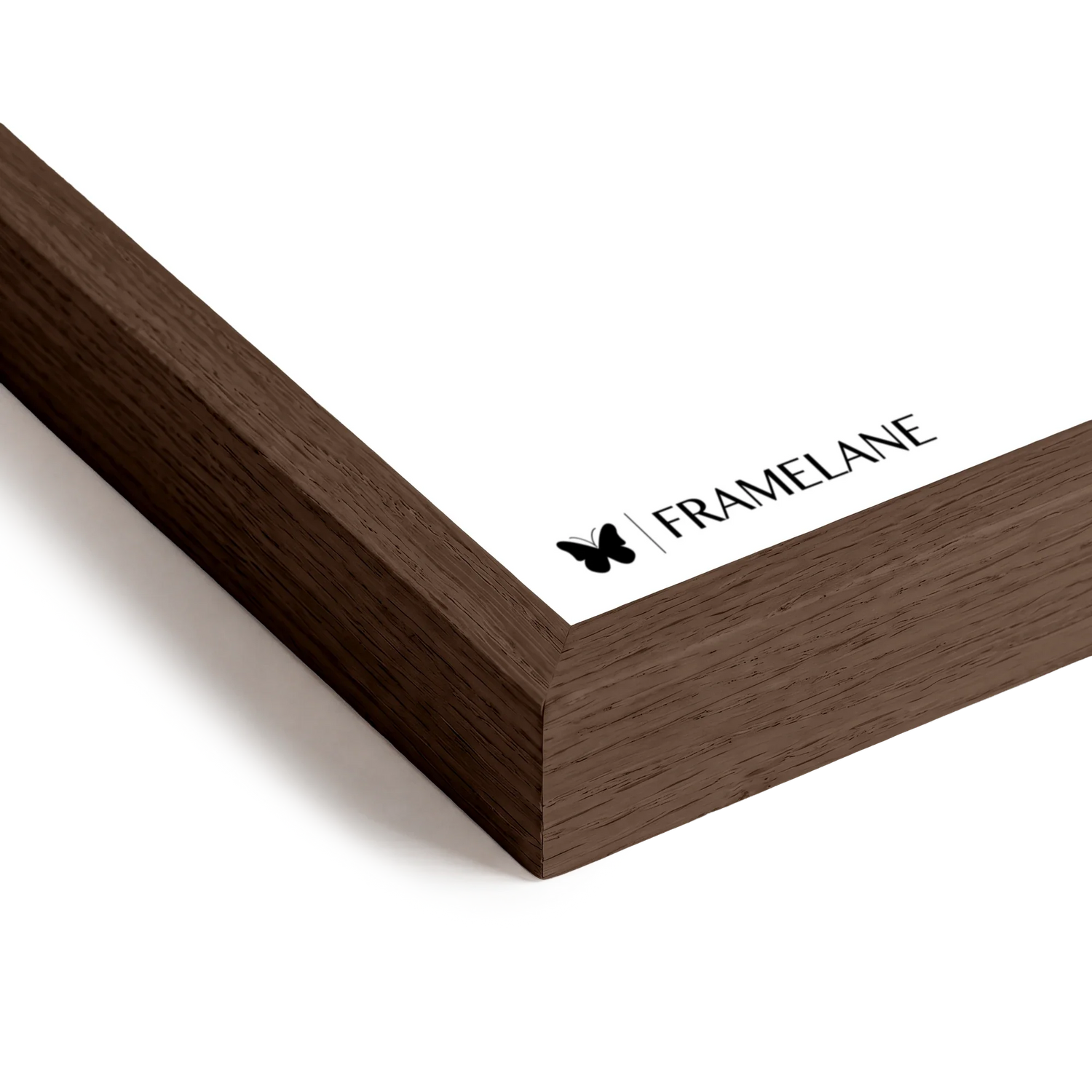 Dark oak frame corner detail showing solid wood grain