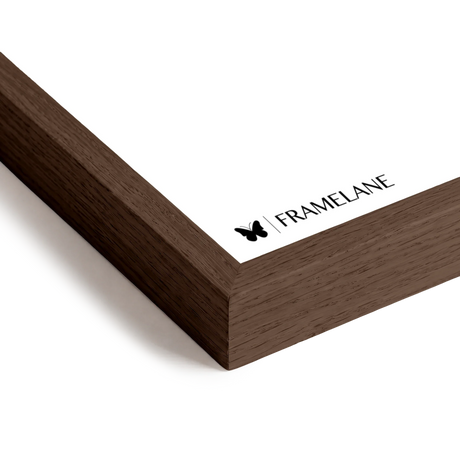Dark oak frame corner detail showing solid wood grain