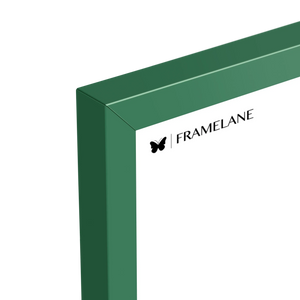 Forest green frame corner detail showing painted solid wood finish
