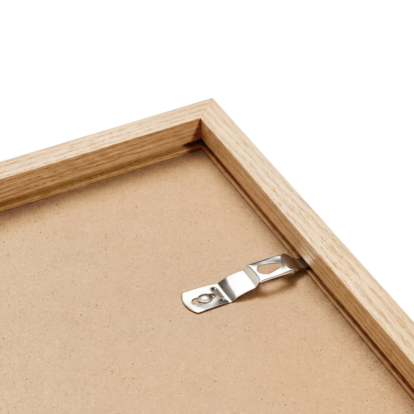 Natural oak frame back corner showing solid wood grain and hardware