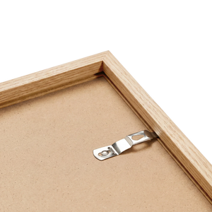 Natural oak frame back corner showing solid wood grain and hardware