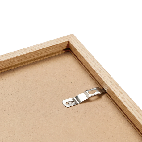 Natural oak frame back corner showing solid wood grain and hardware