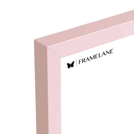 Pink frame corner detail showing painted solid wood finish