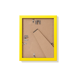 Back of yellow 8x10 in picture frame showing the hangers