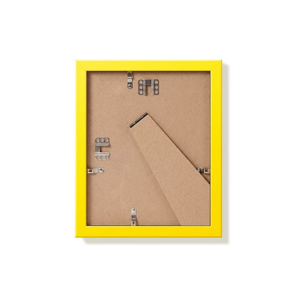 Back of yellow 8x10 in picture frame showing the hangers