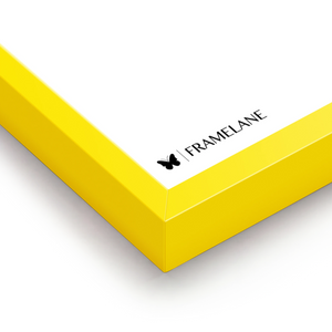 Yellow wood picture frame, bottom corner detail