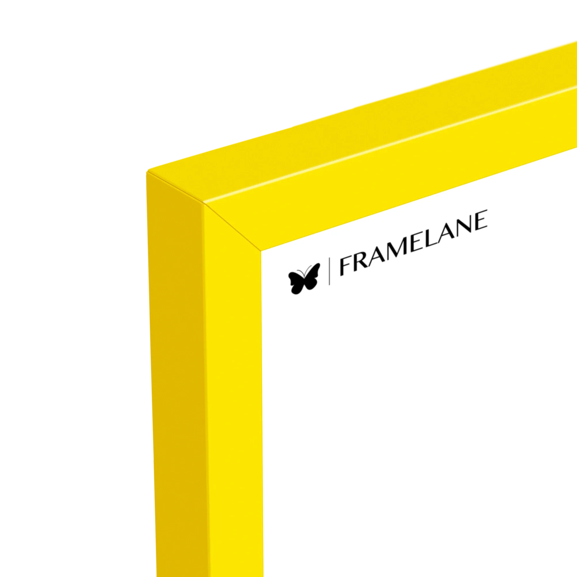 Yellow wood picture frame, top corner detail showing the profile